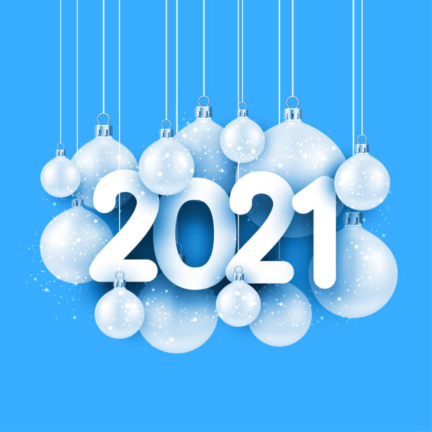 istock 2021 sign among hanging christmas tree toys. 1283309604