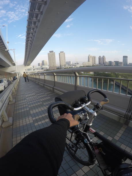 It was taken at sunset while taking the bike away in the pedestrian section.Rainbow Bridge is a suspension bridge connecting Shibaura and Odaiba on Tokyo Bay in Tokyo, the capital of Japan. Construction of the Rainbow Bridge started in 1987 and was completed in 1993. The construction of the bridge was carried out by Kawasaki Heavy Industries.Tokyo/Japan 11/25/2019