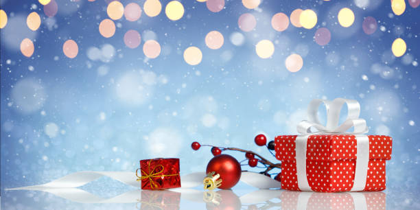 istock Decorative red gift box with a white bow with chtistmas decorations 1283310193