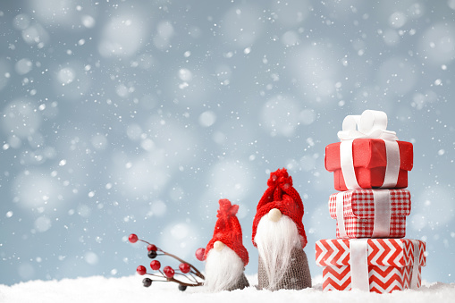 Christmas Gnomes With Gift Boxes On The Snow Background Stock Photo -  Download Image Now - iStock
