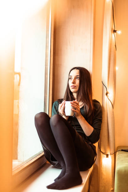 istock sad woman at home for the lockdown at christmas 1283311972