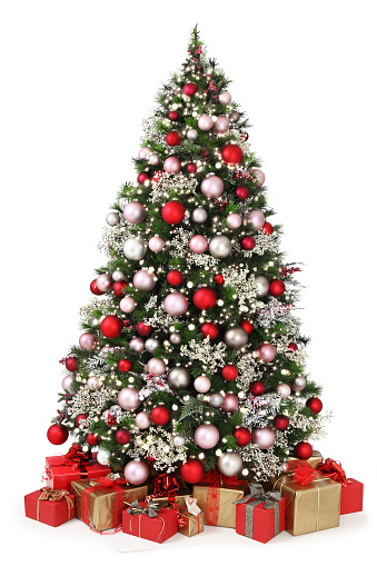 decorated christmas tree full of colored balls, decorations and many gift wrapped  packages isolated on white background