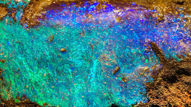 Close up of precious multicolor Opal stone Texture Background of Iridescent Opal Gemstone opal photos stock pictures, royalty-free photos & images