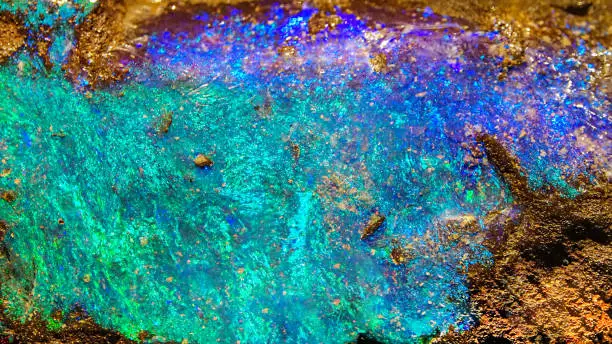 Texture Background of Iridescent Opal Gemstone