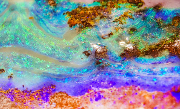 Extreme close up of opal crystal texture Texture Background of Iridescent Opal Gemstone opal photos stock pictures, royalty-free photos & images