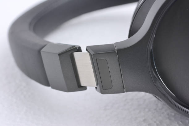 istock Overhead professional headphones close-up, on a gray background 1283315996