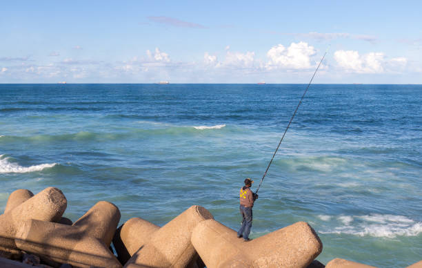 Kyrenia, Cyprus - November 18, 2017: people are fishing in Kyrenia Cyprus