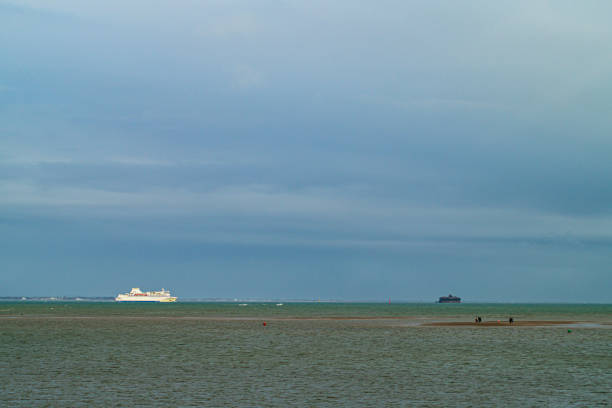 istock View of a ferry and fort on the Solent 1283317071