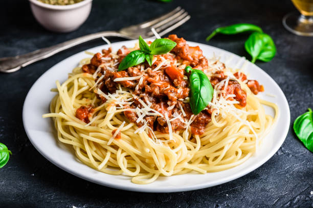 istock Spaghetti with bolognese sauce and parmesan cheese 1283317146
