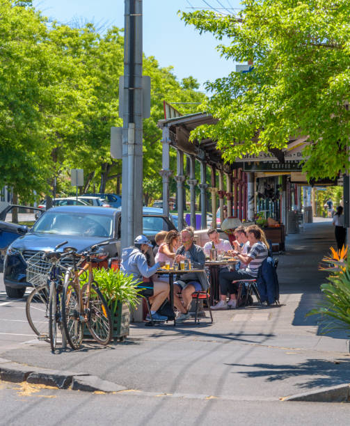 Diners are using outdoor restaurant seating Melbourne, Victoria, Australia, November 1st, 2020: Diners are using outdoor restaurant seating in Melbourne under social distancing rules in the wake of the Covid-19 pandemic melbourne street crowd stock pictures, royalty-free photos & images