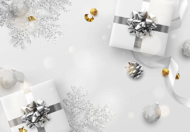 istock Christmas background silver and white colors. Festive bright design composition top view. 1283318001