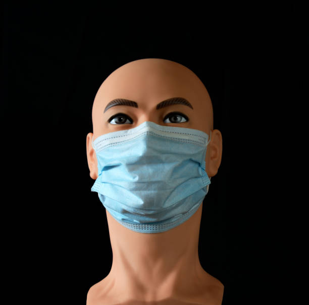 istock Mannequin with protective mask during pandemic 1283320730