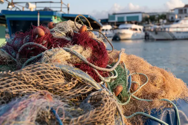 Fishing nets ropes and floats on a harbour. Fishnet on a basket. Latsi, Paphos