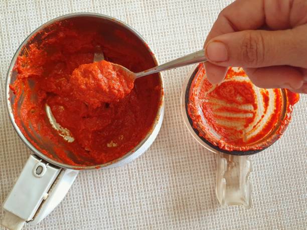 istock Spicy red chili chilli paste for Indian Kerala style fish curry 1283322153