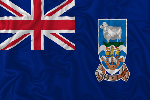 Falkland Islands flag on wavy silk textile fabric background. 3D Illustration.