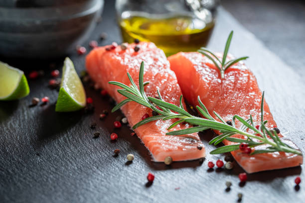 istock Healthy raw salmon with oil and spices 1283324554