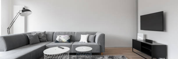 istock Simple and elegant living room, panorama 1283329637
