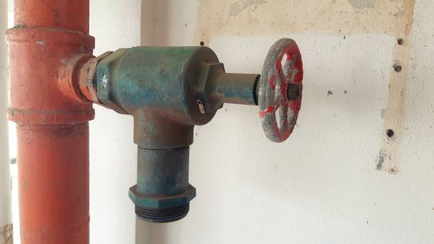 istock Old water rust control valve on the wall industrail valves in largs water supply systems valves for on off water 1283330345