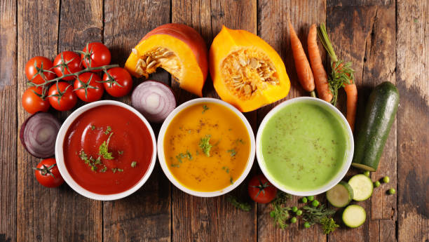 istock assorted of colored vegetable soup- tomato, pumpkin and zucchini soup 1283331584