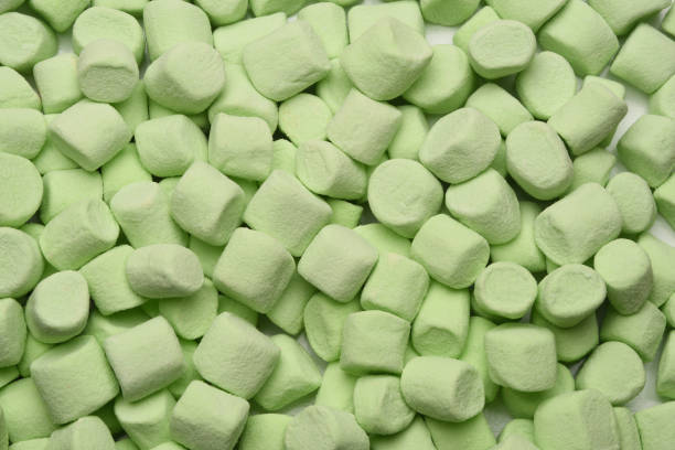 istock Green mini marshmallows filling the frame 1283332723