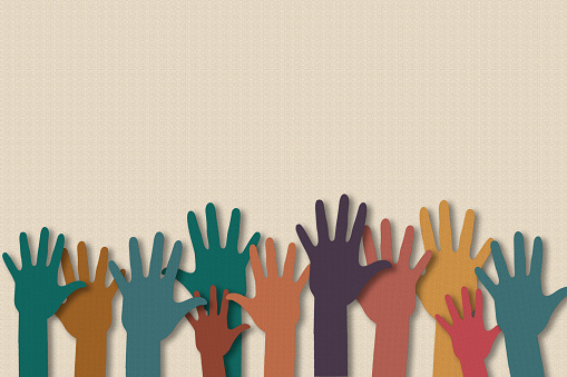 Teamwork, Volunteer, Community service and charity work concept. Paper cut of hand raise up many people and join hand together on paper texture background. With copy space for your text.