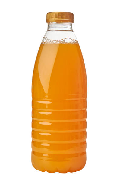 istock Plastic bottle of orange juice isolated on white 1283342214