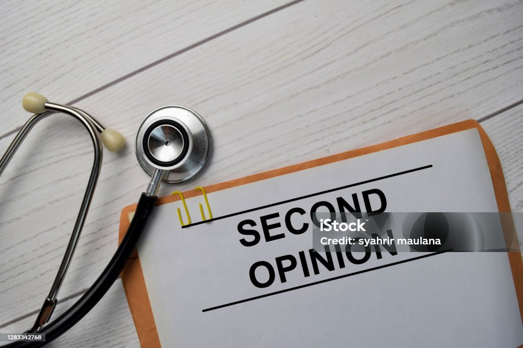 Second Opinion text with document brown envelope and stethoscope isolated on office desk. Second Place Stock Photo
