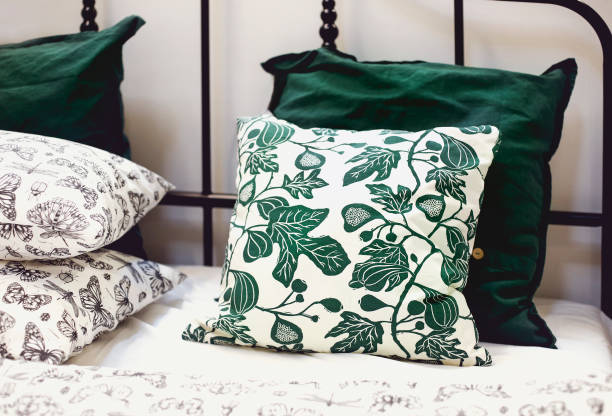Cozy colorful pillows on bed