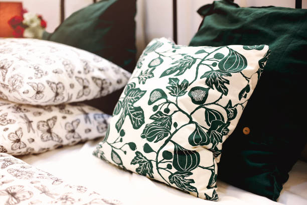 istock Cozy colorful pillows on bed 1283346545