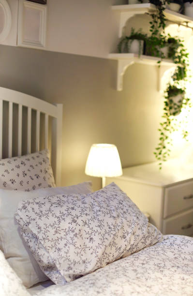 istock Cozy colorful pillows on bed 1283346575