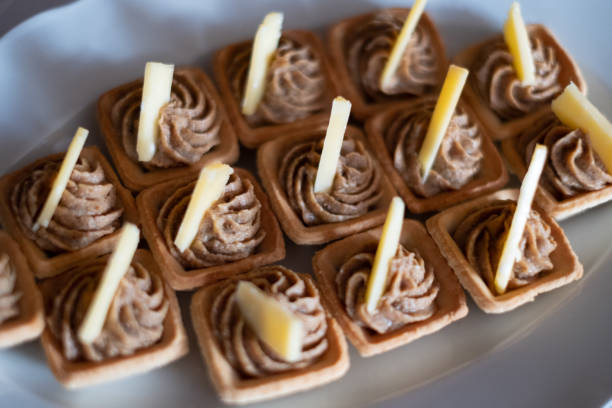 istock Bite sized finger food with pate and cheese in shortcrust pastry. 1283346815
