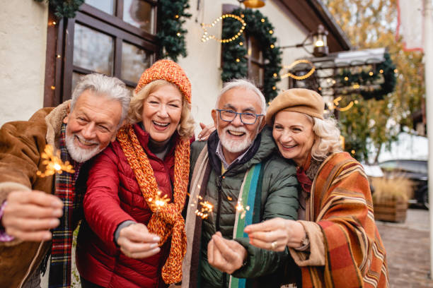 istock Seniors celebrating Christmas outdoors 1283348310