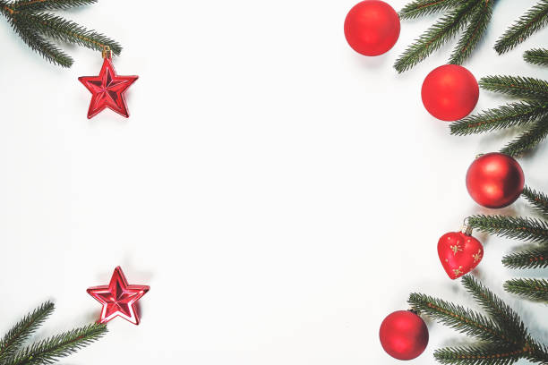 istock Christmas fir branches decorated with toys, on a white background. 1283349499