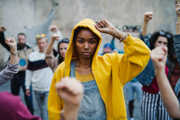 istock Group of people activists protesting on streets, protests demonstration and coronavirus concept. 1283353384