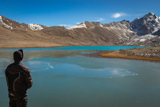 istock men soaking the breathtaking frozen lake view surrounded by himalayan mountains 1283357534