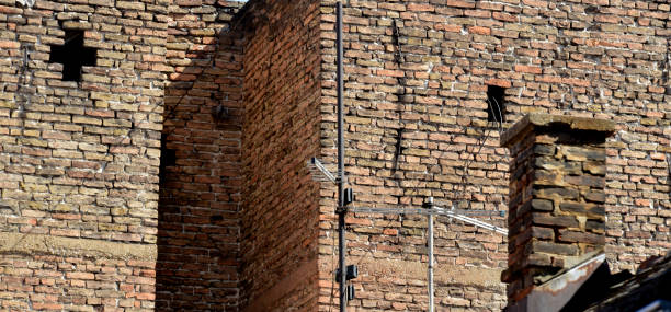istock Peeled facades of old buildings 1283358886