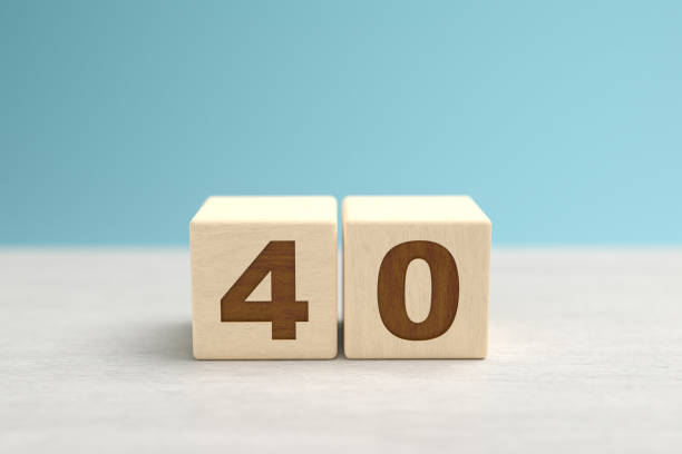 istock Wooden toy blocks forming the number 40. 1283360199