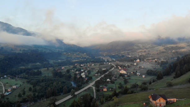 istock Mountain green hill valley village view. 1283360684