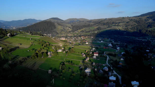 istock Village in the mountains aerial view. 1283361433