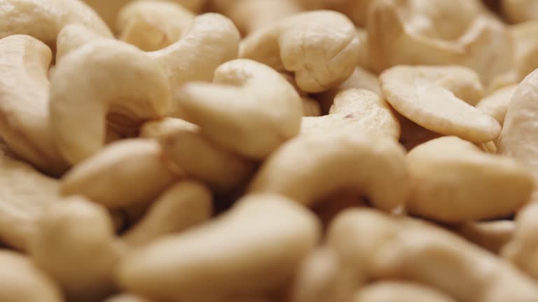 Smooth Camera Movement Over a Handful of Cashew Nuts.