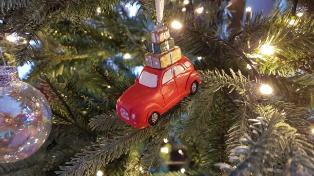 istock Little red car Christmas bauble 1283365597