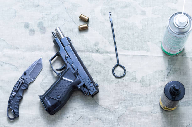 istock Pistol, knife and ramrod. View from above. 1283365657