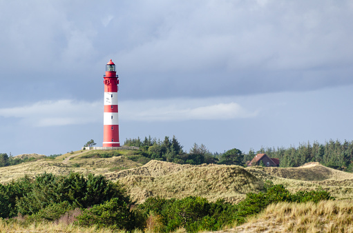 Amrum lighthouse. Amrum is one of the North Frisian Islands on the German North Sea coast, south of Sylt and west of Foehr