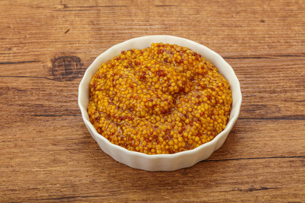 istock Dijon mustard sauce with seeds 1283372118