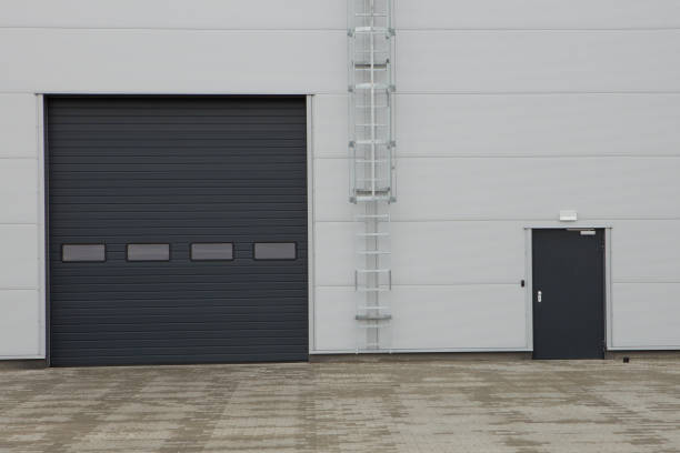 istock Rolling gate or roller shutter used for factory, warehouse or hangar. 1283373979