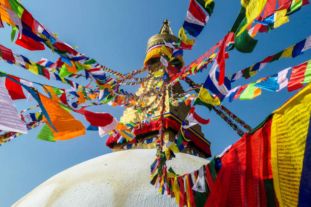 istock Kathmandu - Colorful Prayer flags hanging from Boudhanath Temple 1283375813