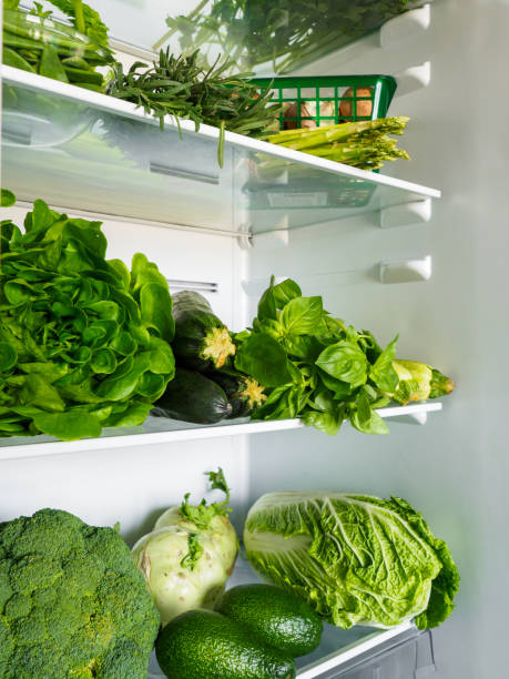 istock Opened refrigerator full of fresh vegetables. 1283380112