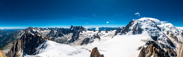 The Mont Blanc massif, with the Giant's tooth, the Aiguille du Midi, the Aiguille Noire, from Punta Helbronner, through the skyway