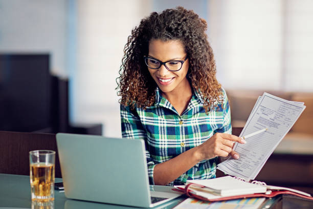 istock Woman is working at home and video conferencing using her laptop 1283381181