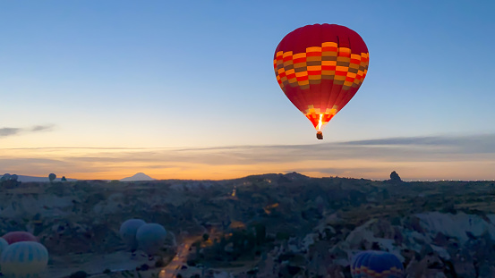 Air Ventures balloon safaris in Johannesburg at cradlemoon nature reserve with the balloon rising up in the sky, taking guests for a ride. July 29, 2023.